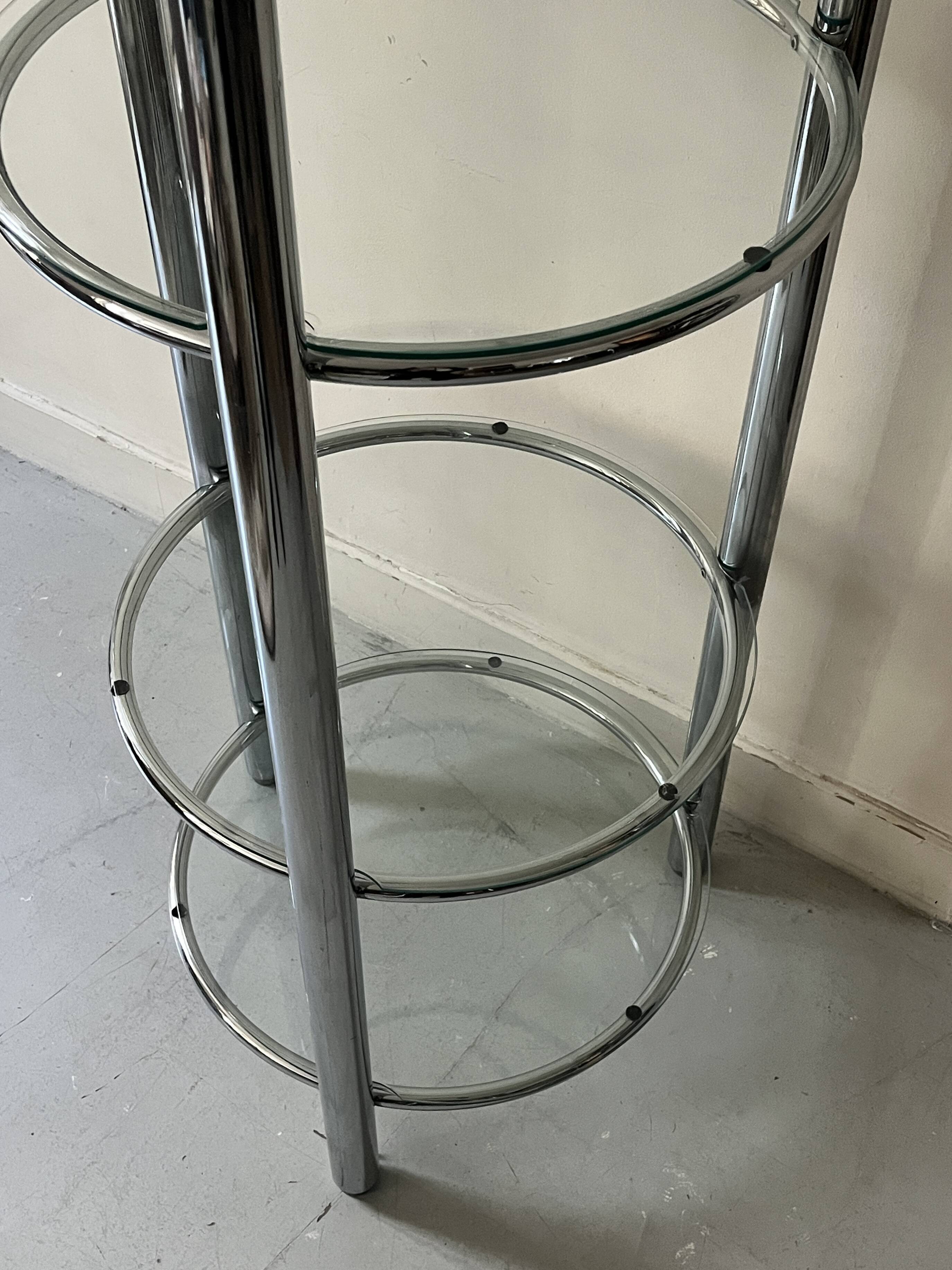 Round tubular bookcase in chrome and glass, 1970 design