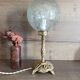 Retro-chic upcycled lamp | bronze and spherical glass
