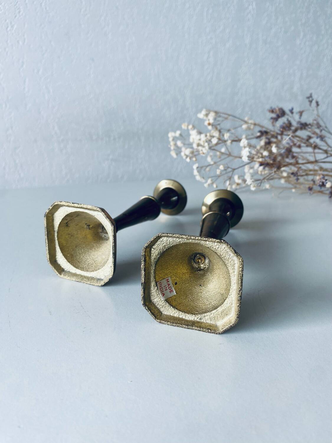 Pair of Indian brass candlesticks