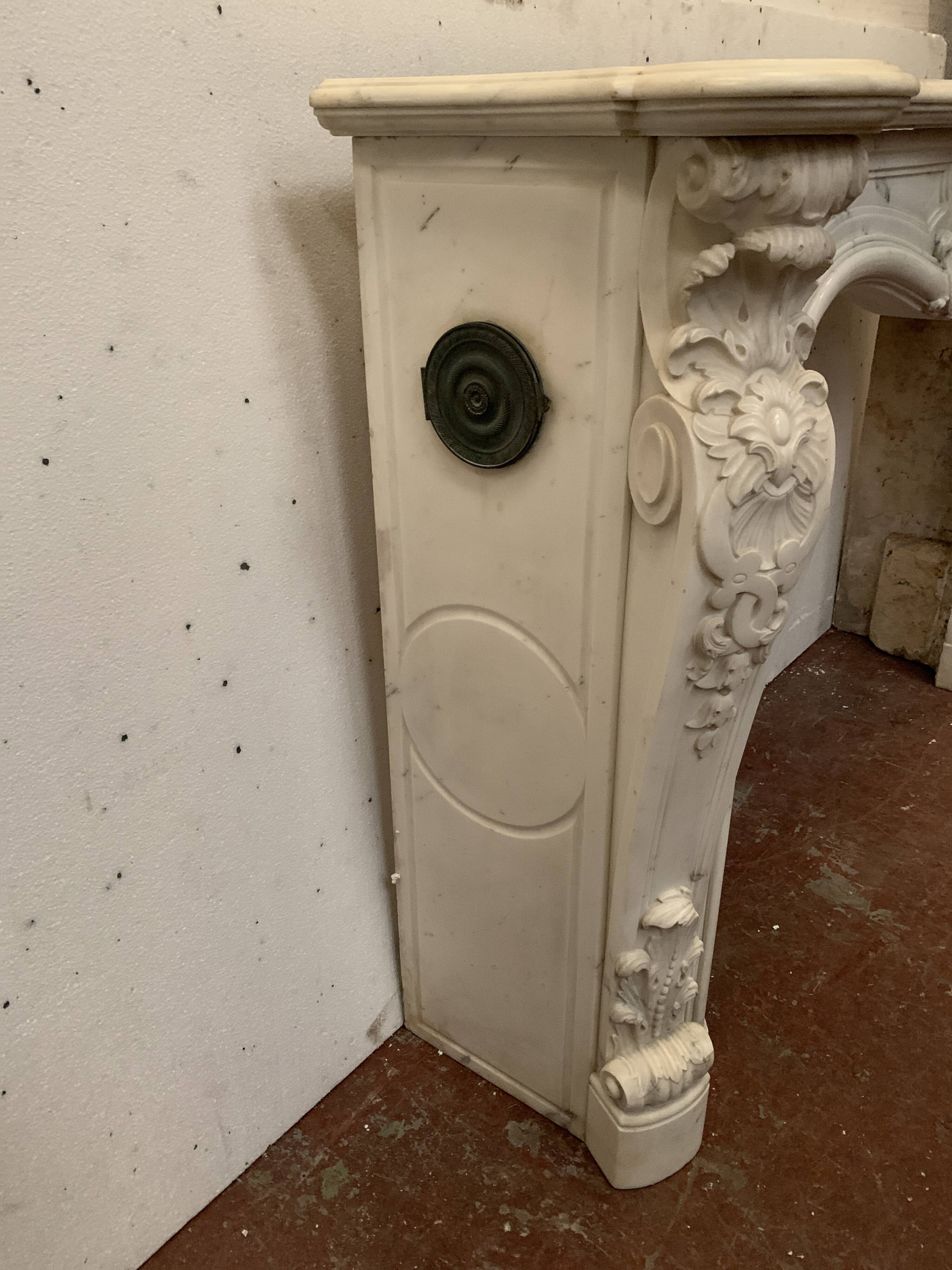 Louis XV style fireplace in white Carrara marble, 19th century