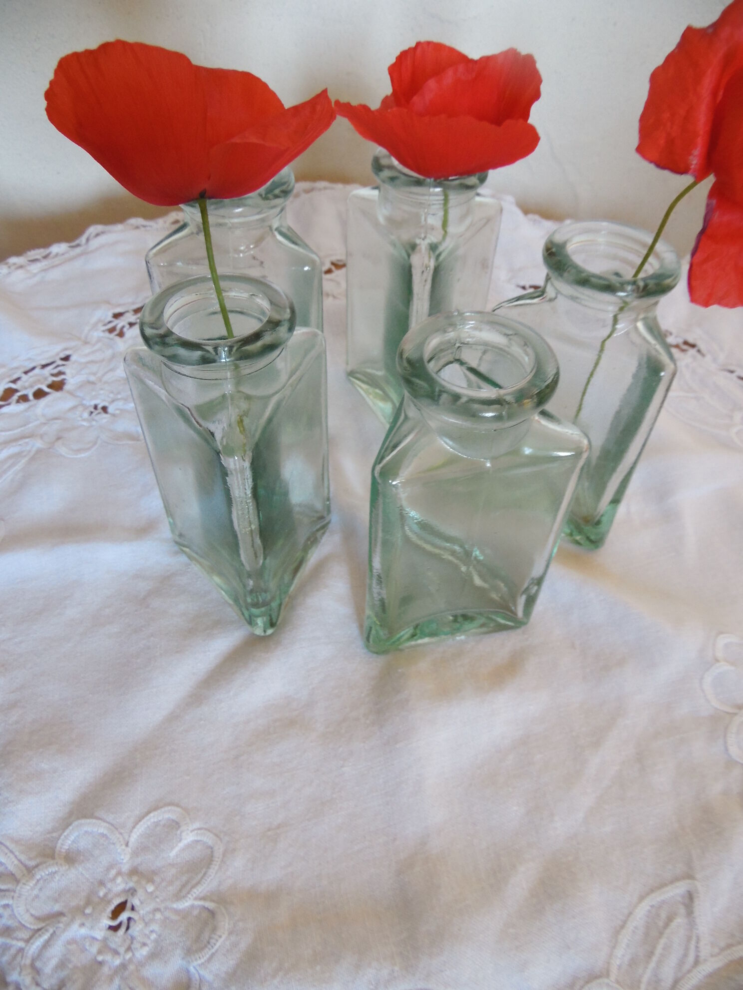 Lot of 5 triangular glass apothecary bottles