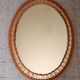 Oval mirror with woven rattan frame 63x47