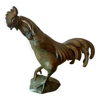 Old brass ashtray in the shape of a rooster