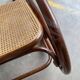 Fauteuil à bascule vintage en rotin