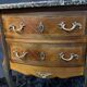 Petite commode demi-lune à décor marqueté et bronze style Louis XV