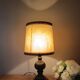 turned wooden table lamp, vintage leather shade