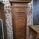 11-drawer solid oak craft cabinet