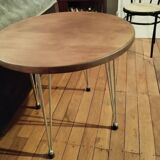 Round side table serving Eiffel leg oak top