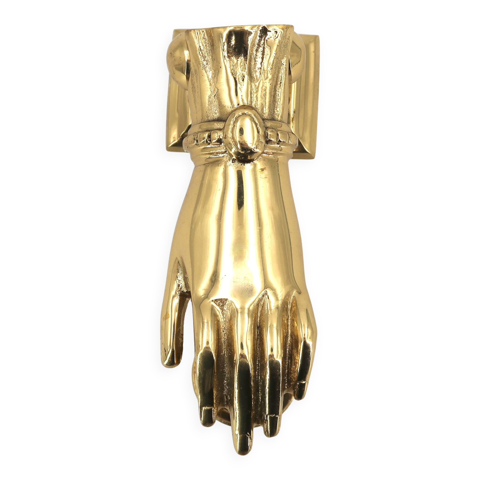 Brass door knocker in the shape of a hand, 1970s.