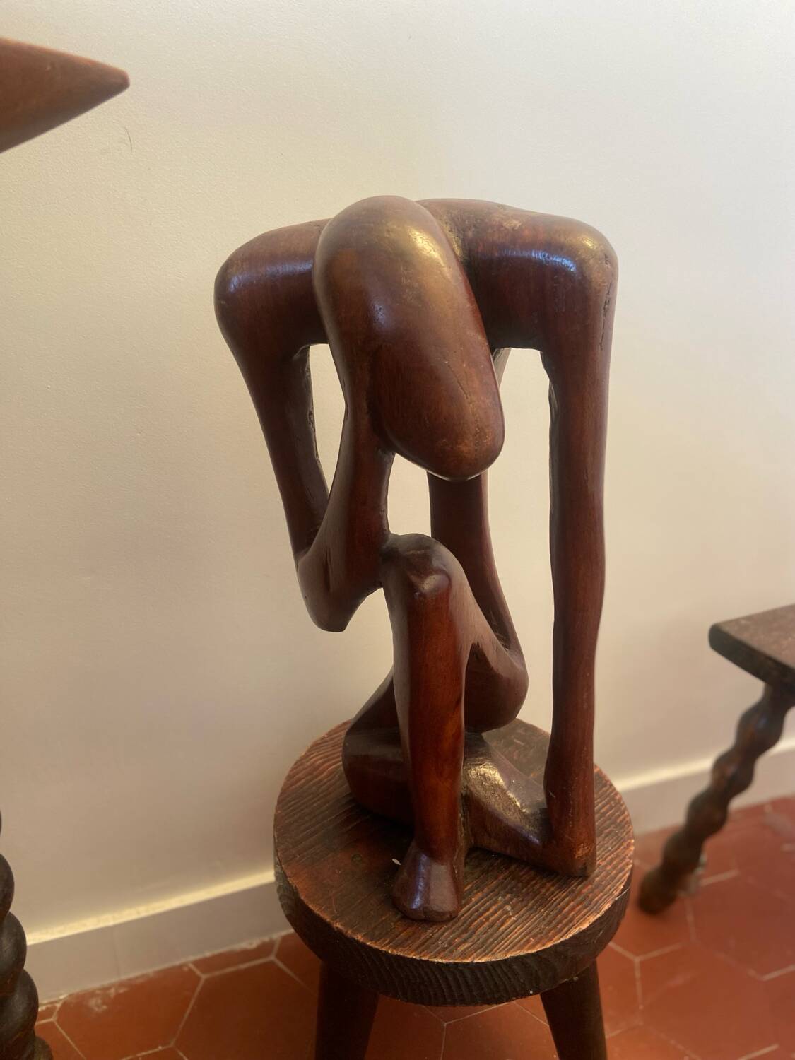 Wooden sculpture the Thinker
