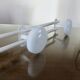 White lacquered metal wall coat rack with 3 hooks, 1980