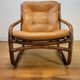 Vintage rattan armchair with leather cushions from 1970