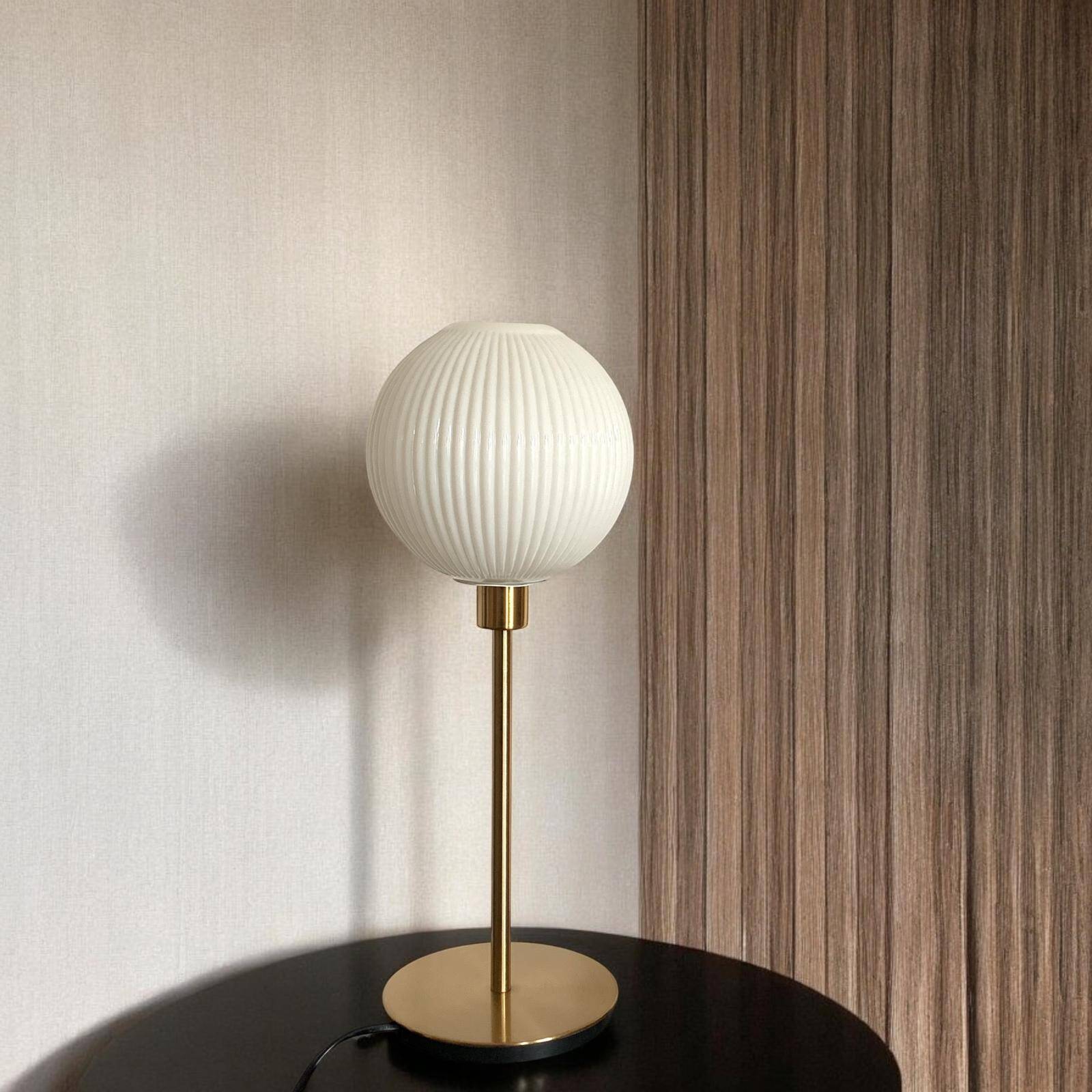 Table lamp with a lampshade from an old vintage pendant light in ribbed white glass and a pi