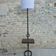 Lampadaire en fer forgé avec tablette en grès décor herbier, années 60