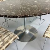 Old marble dining table with metal tulip base from the Italian design in the 60s