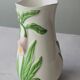 Vase in slipware with Arum flowers