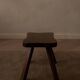 Vintage wooden stool in organic shape