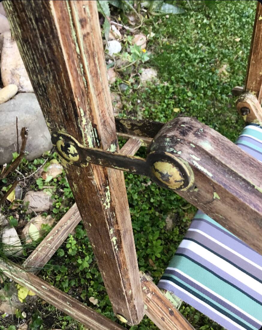 Pair of 19th-century wooden deck chairs with pegged frames and wrought iron