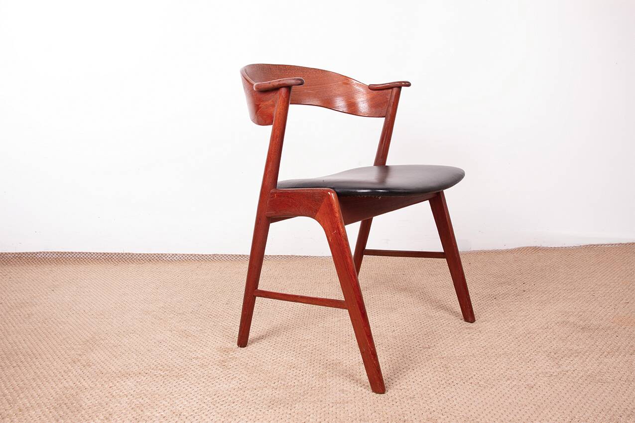 Danish armchair in teak and Skai, by Henning Kjaernulf for Korup Stolefabr.