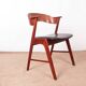Danish armchair in teak and Skai, by Henning Kjaernulf for Korup Stolefabr.