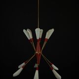 Mid-Century 12 lights chandelier in the manner of Stilnovo. Italy 1950s