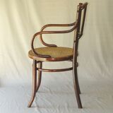 Small canned armchair; in curved wood, bistro, 1890