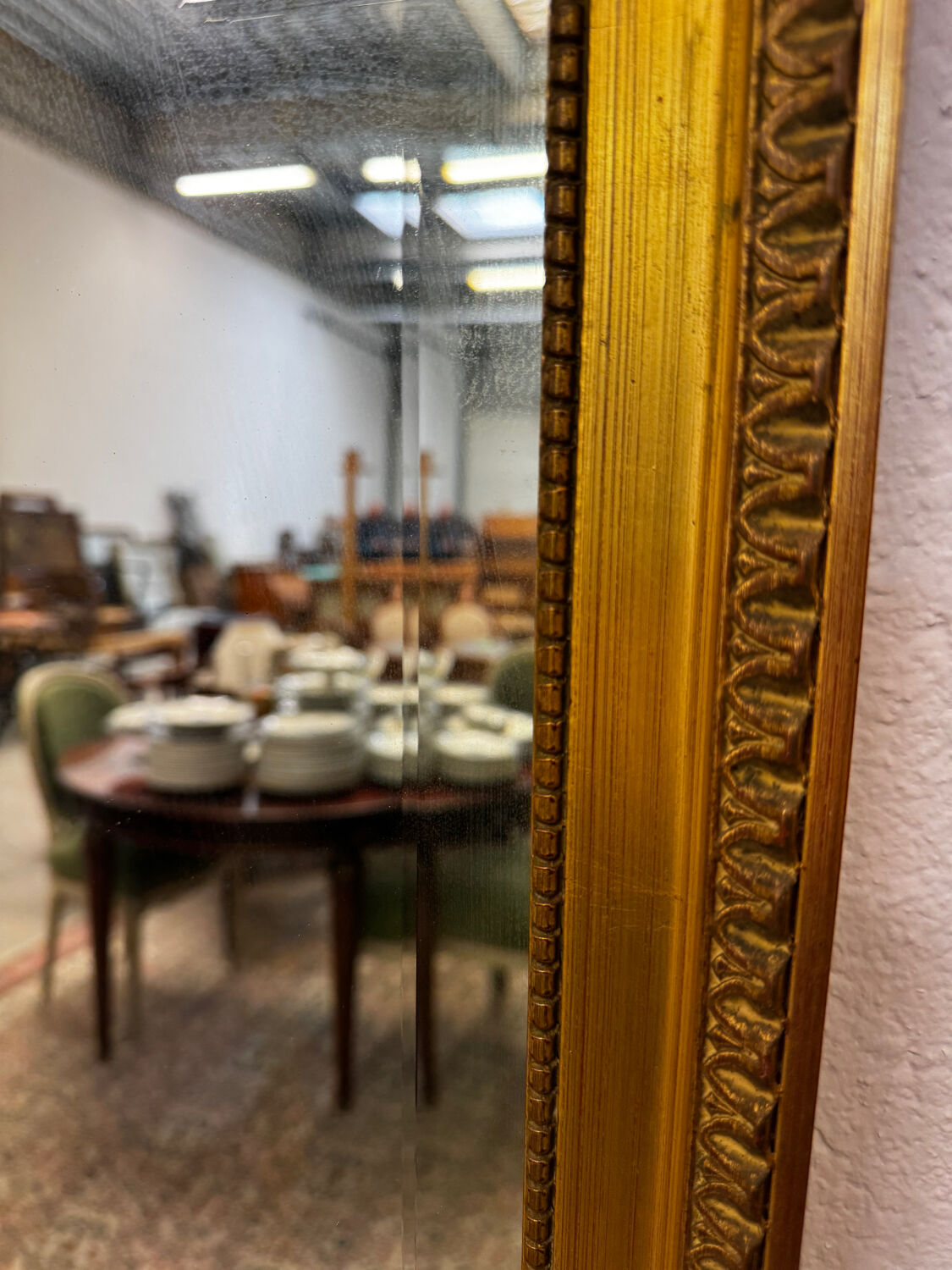 Large gold mirror in the Louis XVI style