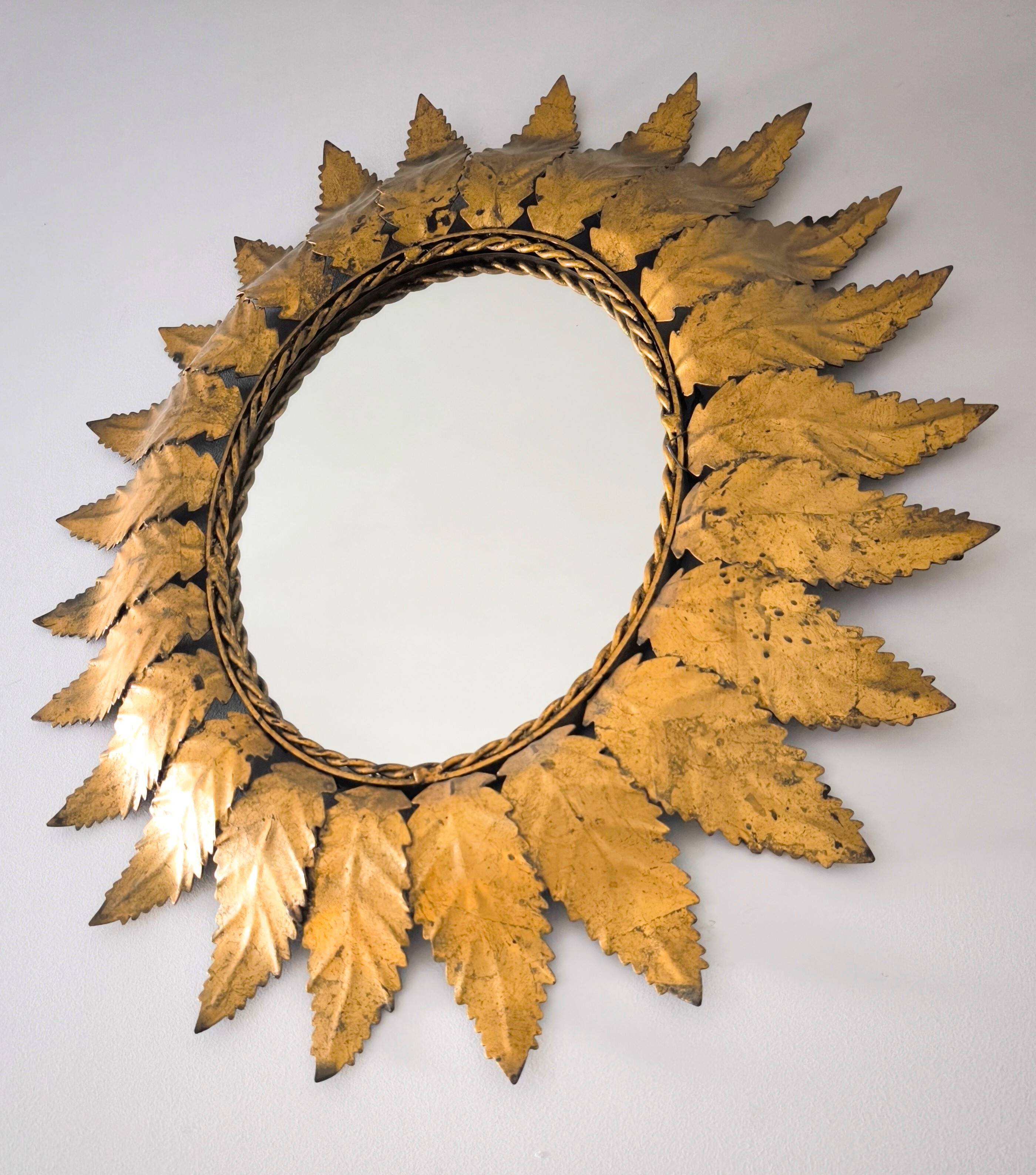 "Sun Mirror" Spanish mirror from the 1960s, made of gold metal.