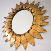 Miroir «Sun Mirror» espagnol des années 60, en métal doré.