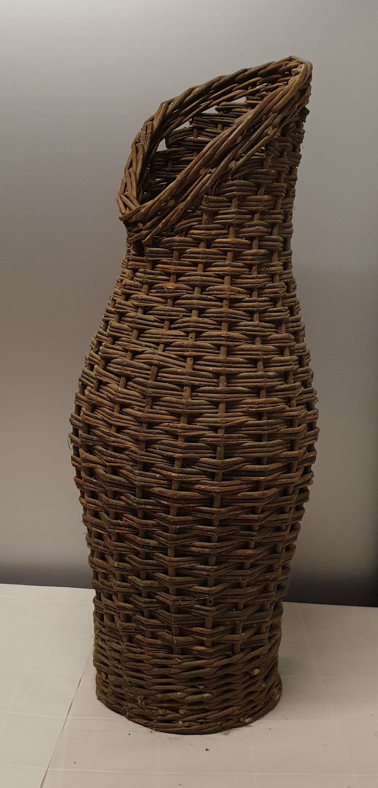 Porte-parapluie vintage en osier