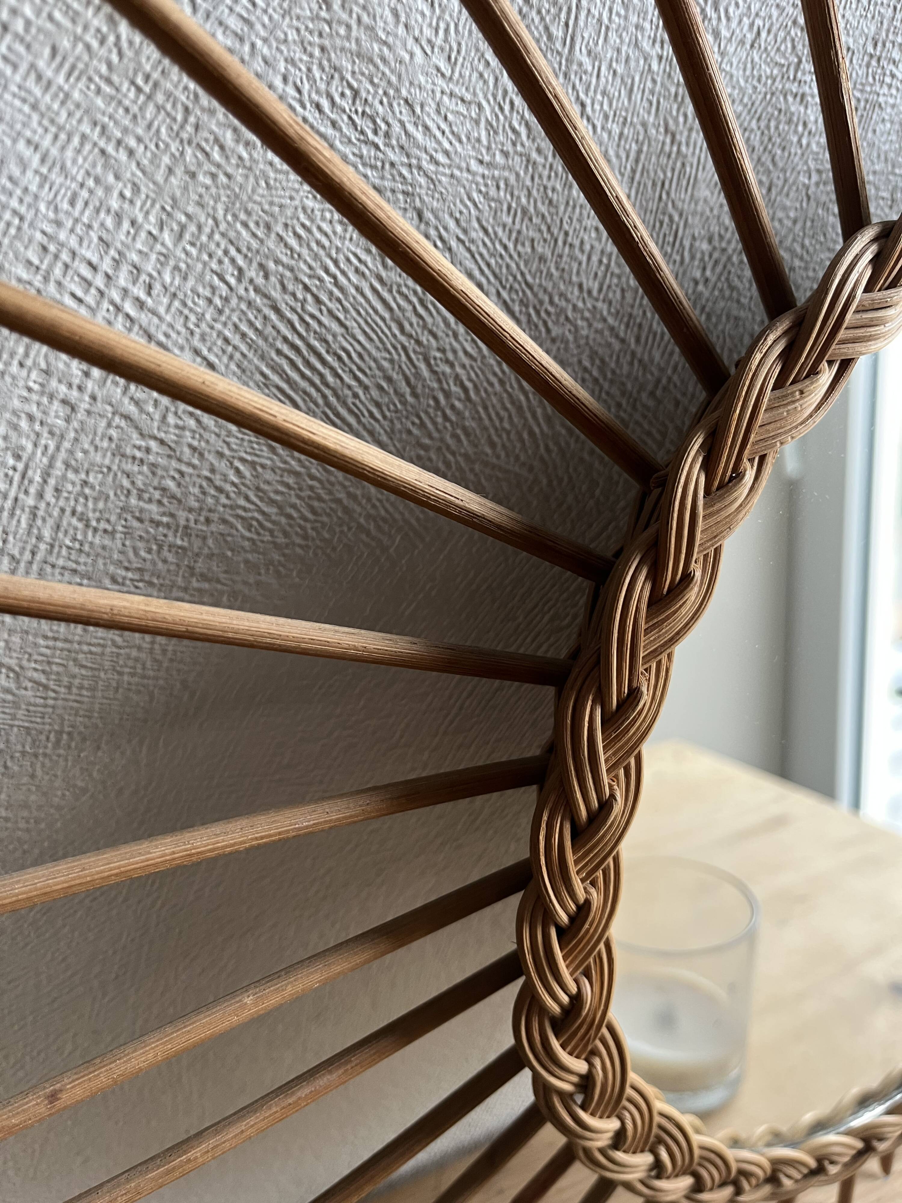 Vintage rattan sun mirror