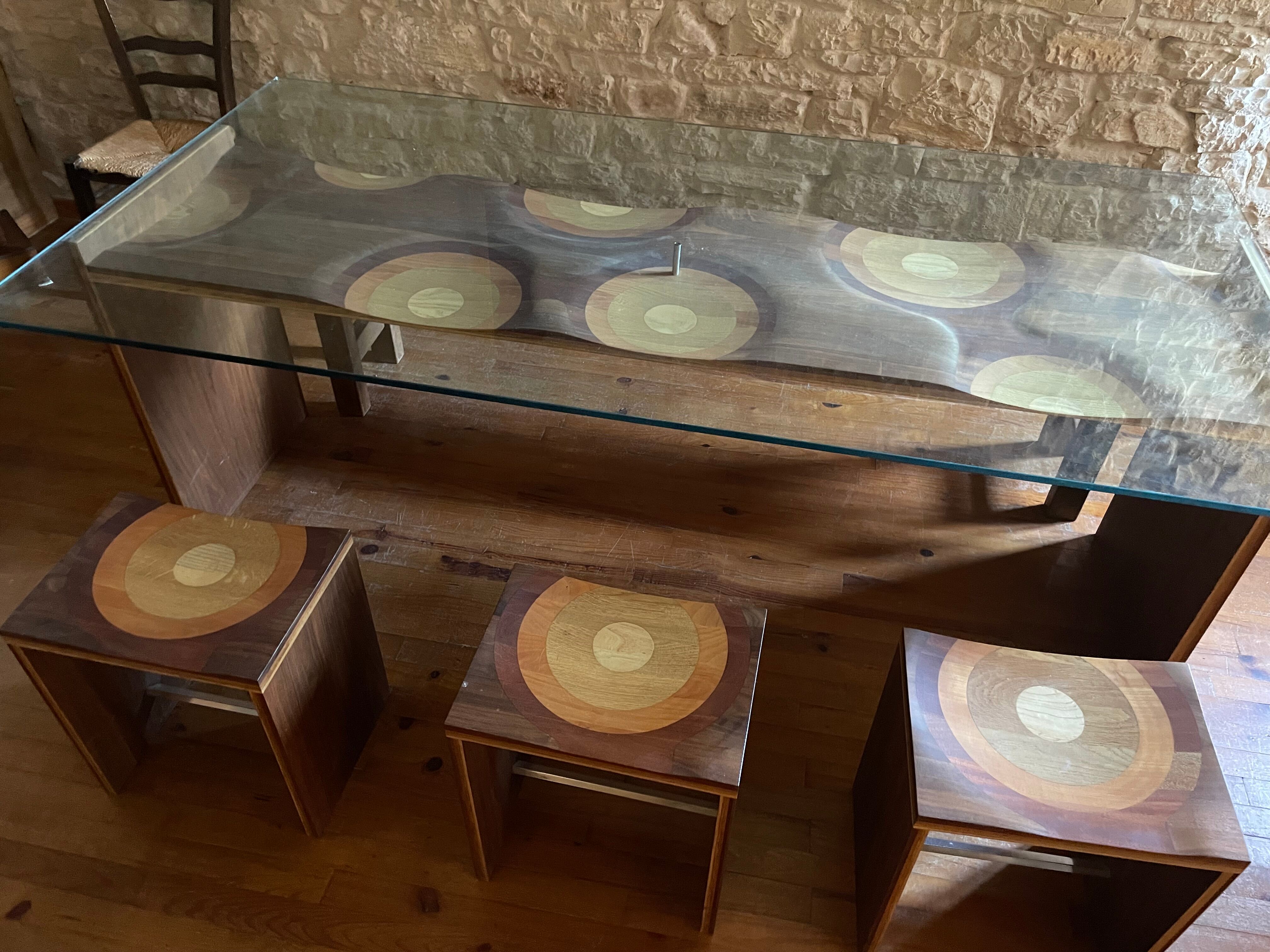 Dining table and 3 Ripples stools by Toyo Ito.
