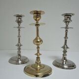 three brass and chrome candle holders early twentieth century