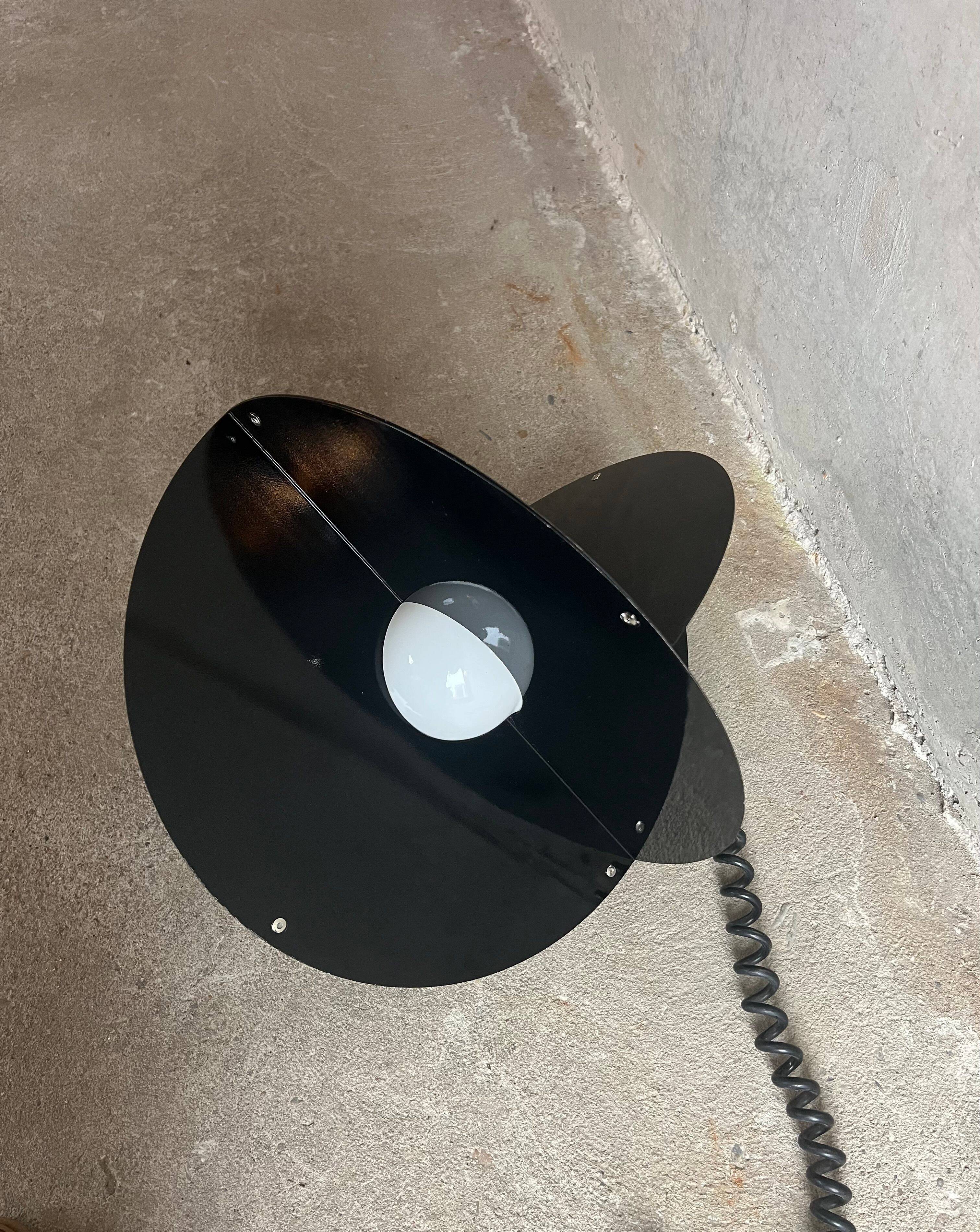 Black “Luna” lamp by Rinaldo Cutini