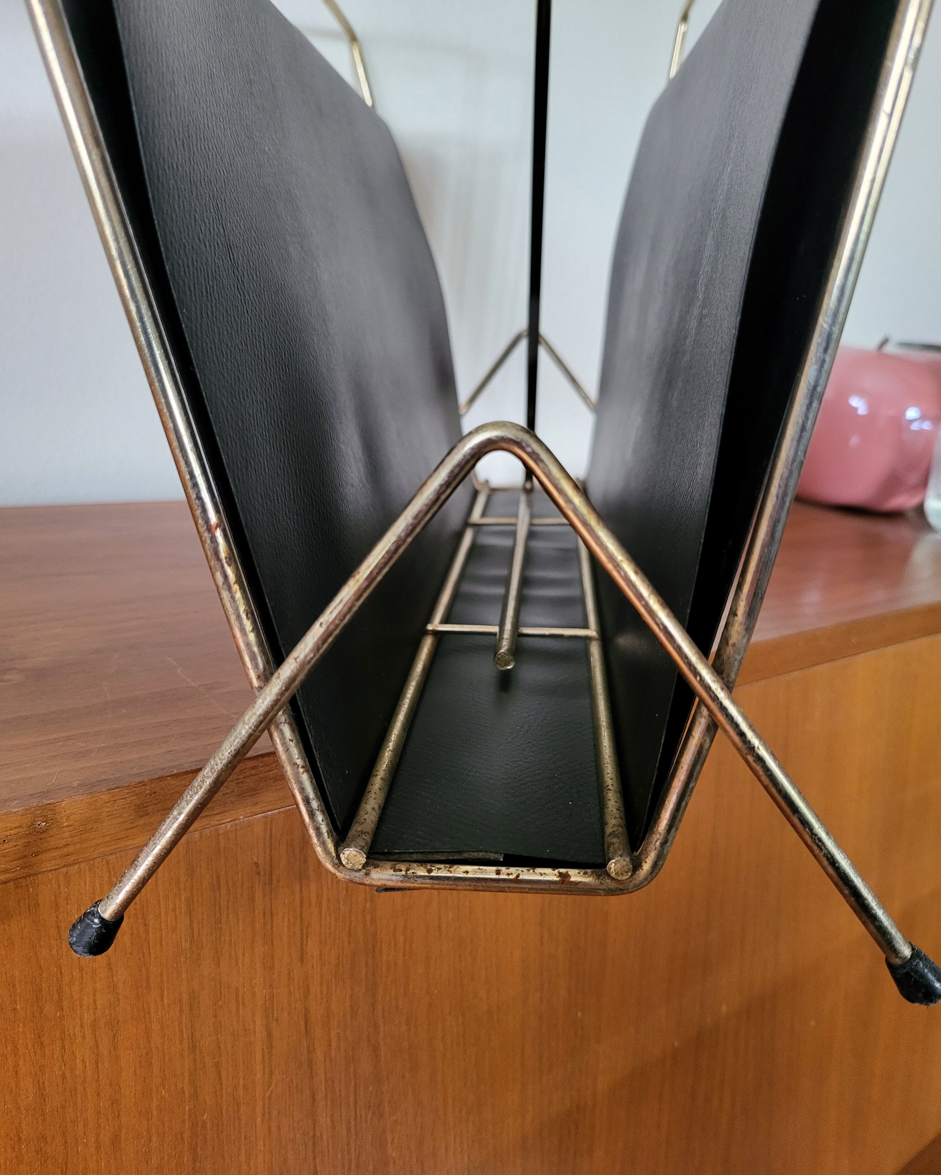 Vintage metal magazine rack in gold and black vinyl Newspaper holder