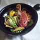 Plate caquelon in vintage slurry style Vallauris theme fish