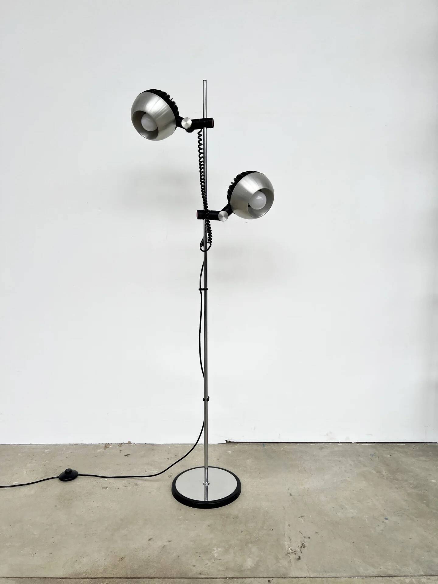 Two-spot floor lamp phase — brushed steel and matte black — 1970s