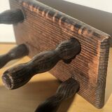 Small wooden bench with beaded legs