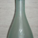 Transparent blue decanter with bubbles