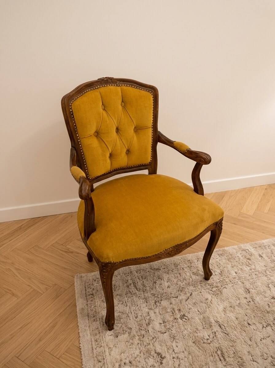 Louis XV style armchair in yellow velvet.