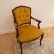 Louis XV style armchair in yellow velvet.
