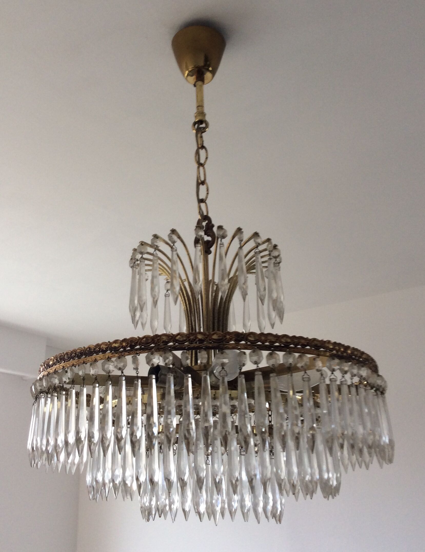 Old waterfall chandelier with grapevines and bronze