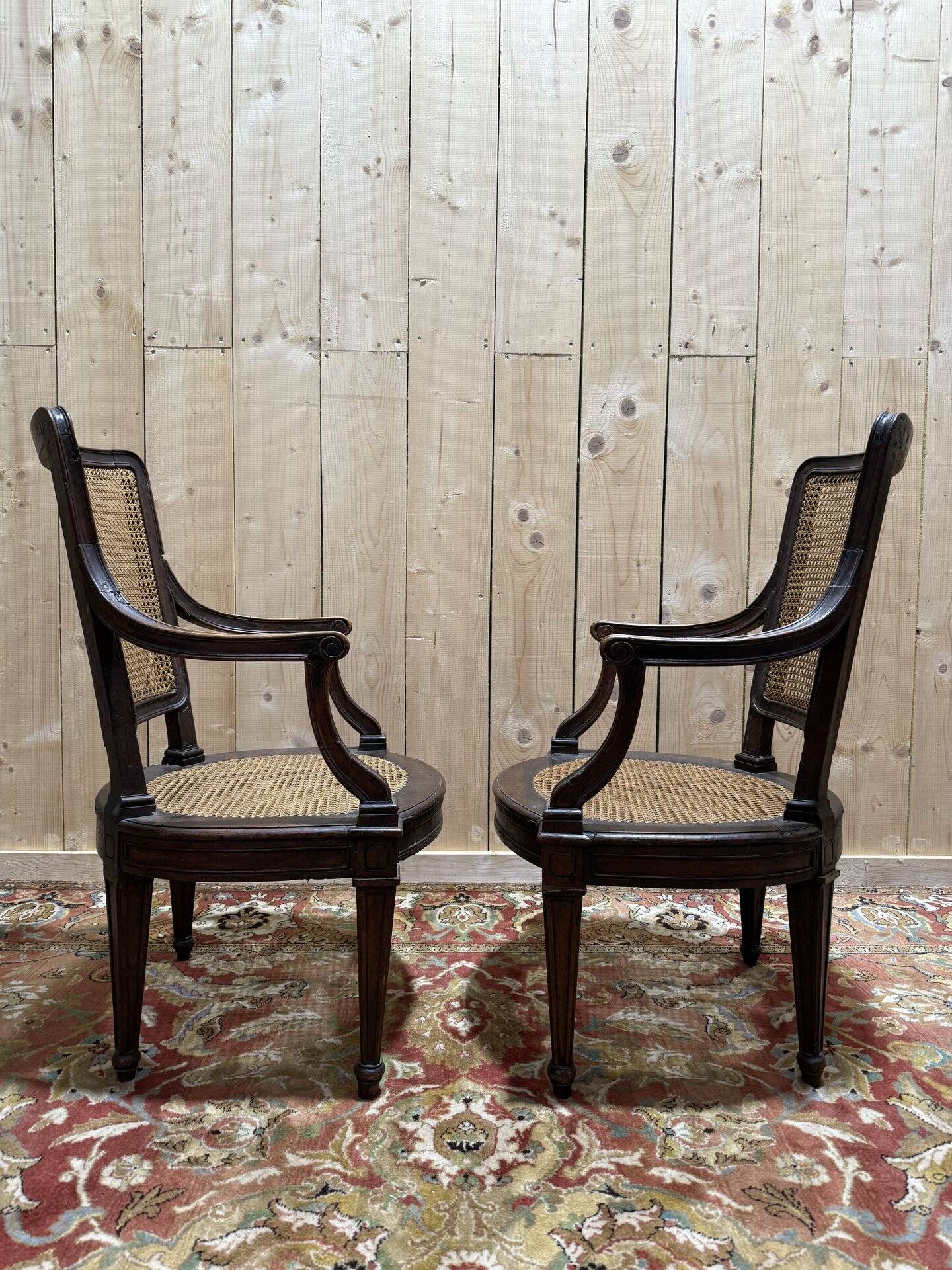 Pair of Louis XVI period caned armchairs