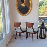 Pair of mahogany gondola chairs – Empire style – 20th century, restored