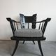 Pair of antique hand-carved armchairs in black lacquer from the 1920s.