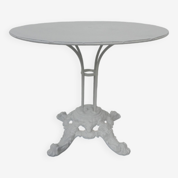 Steel garden table with cast iron base