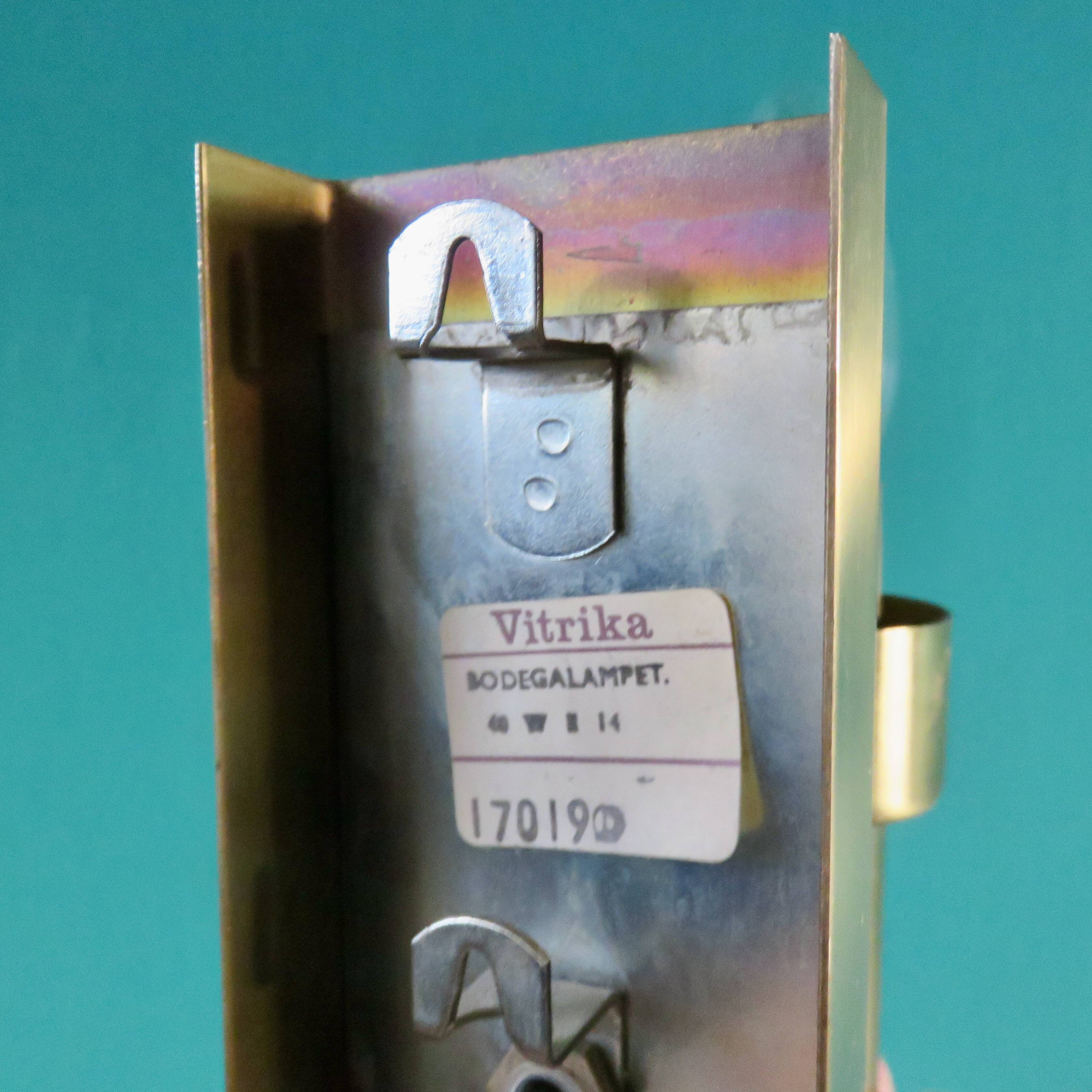 Brushed brass wall light with green glass shade "Vitrika". Denmark 1980