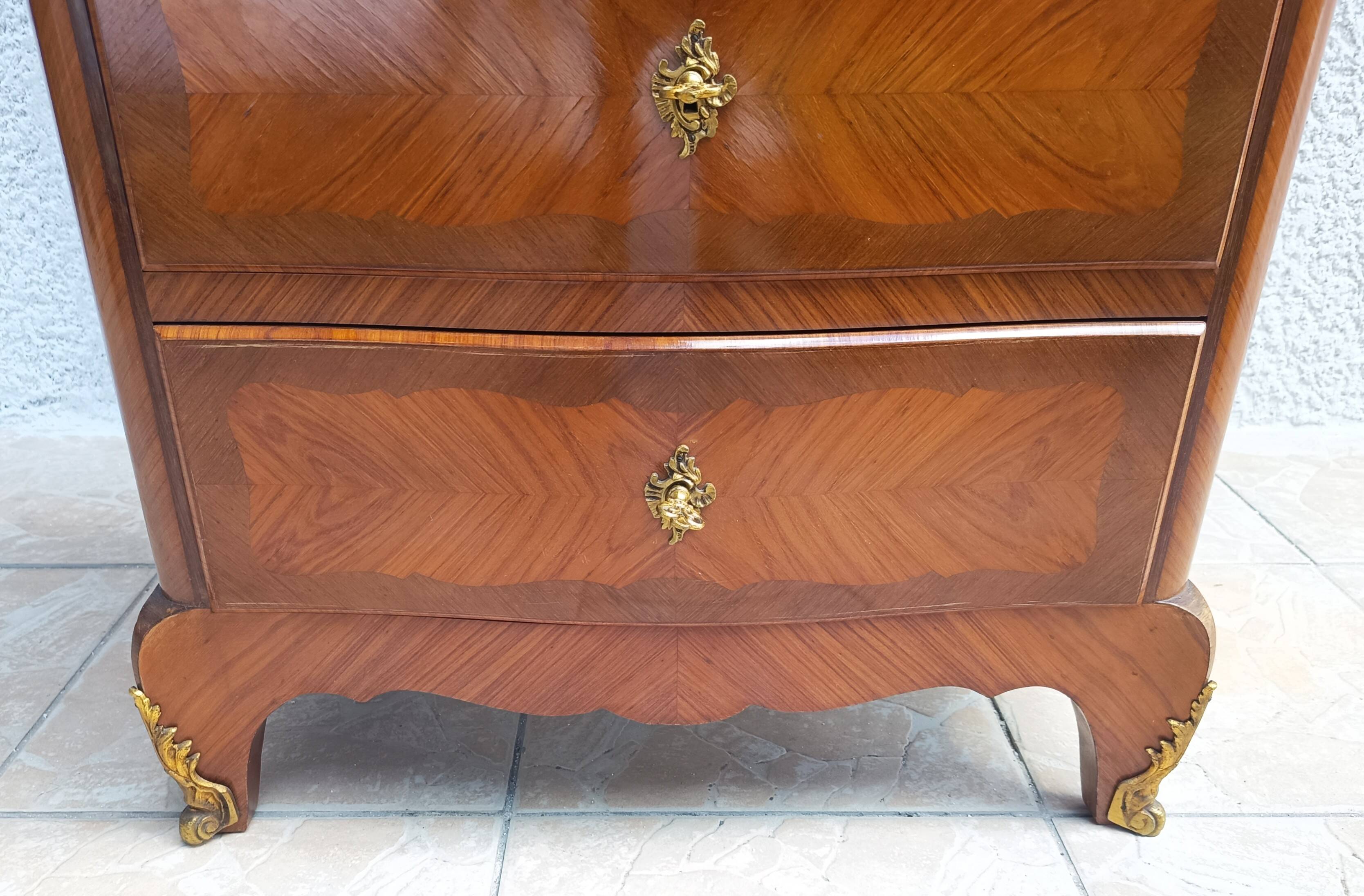 Louis XV style chest of drawers in precious wood veneer.