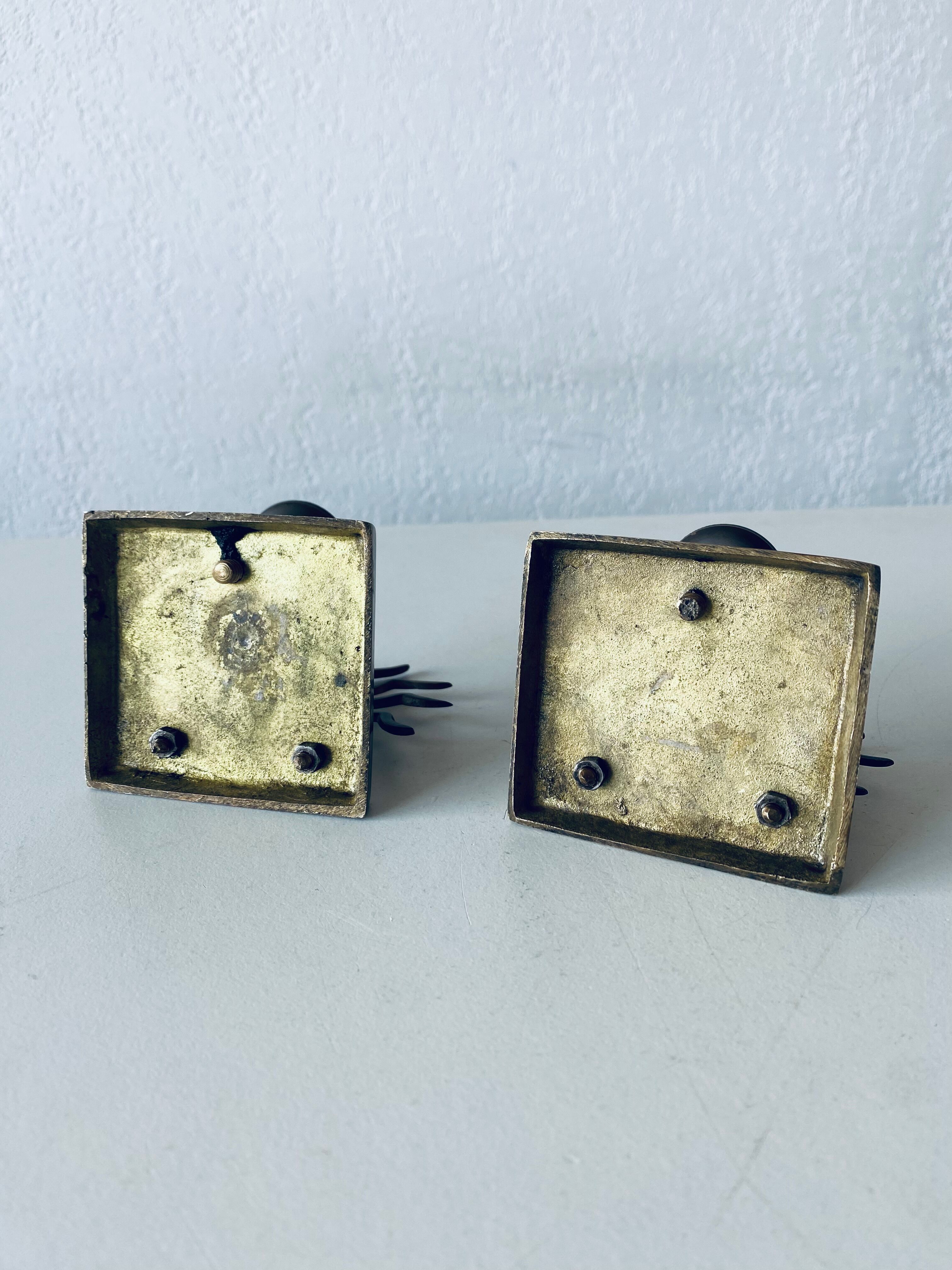 Pair of sun candle holders