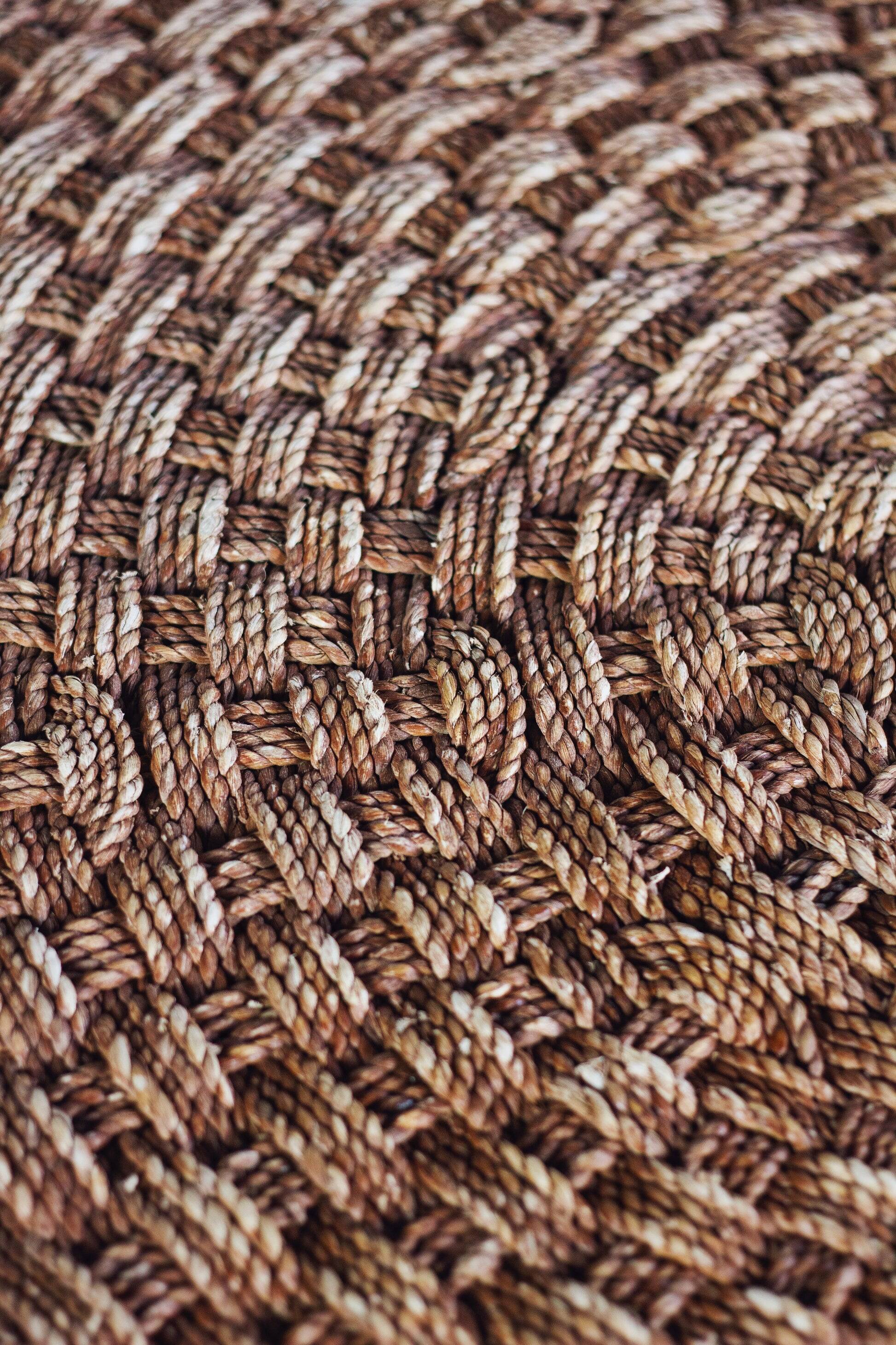 Round coffee table in braided cord and rattan, 1970.